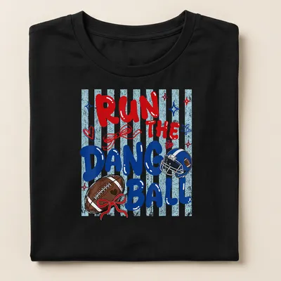 Football Mom t-shirt featuring preppy stripes and bold text about cheering for the team. — printed on a women's shirt