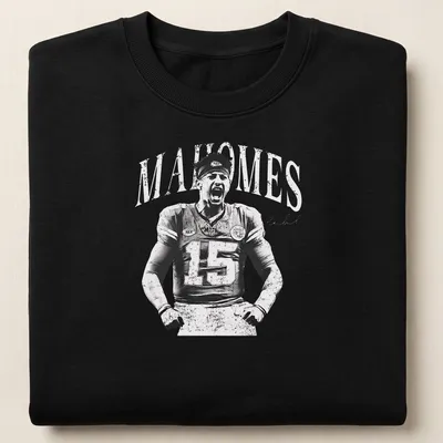Vintage print tee featuring the name MAHOMES in bold font — printed on a unisex sweatshirt