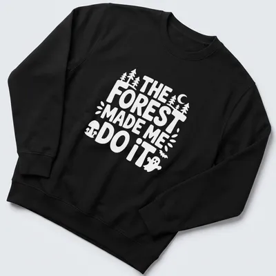 Vintage print featuring a forest scene and the text The Forest Made Me Do It — printed on a unisex sweatshirt