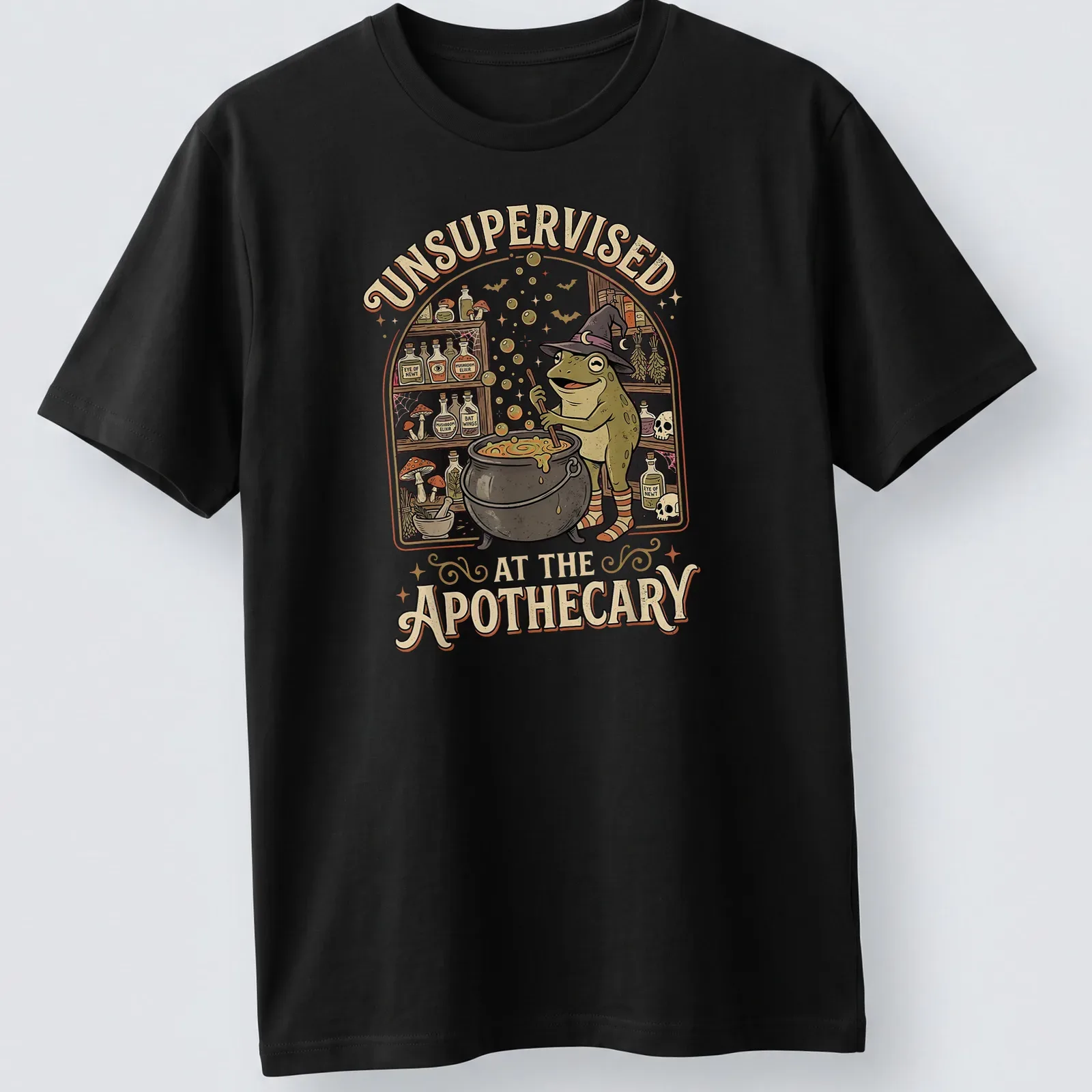 Vintage cartoon frog brewing potion with humorous text about apothecary — printed on a unisex t-shirt
