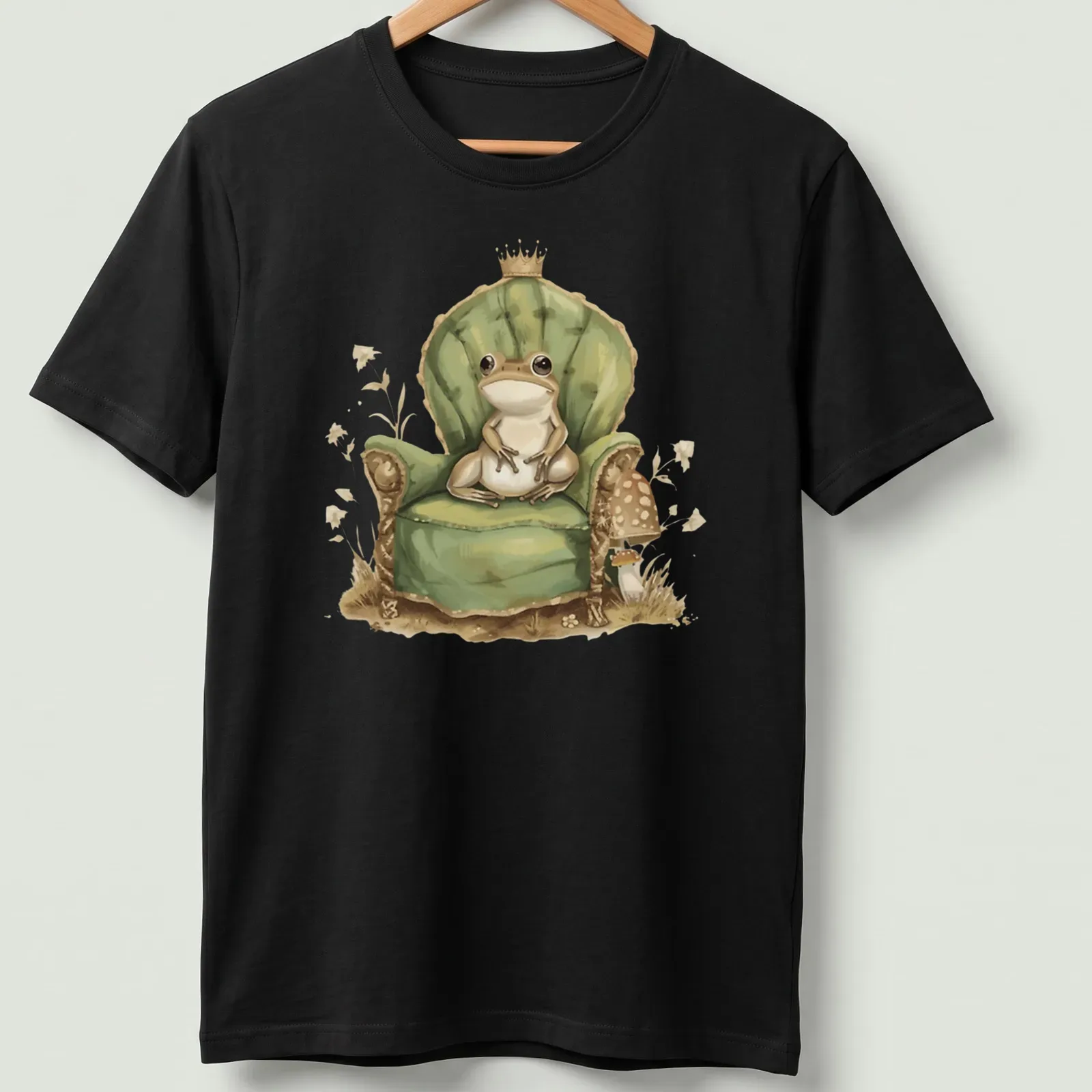 Whimsical illustration of a frog prince in a crown on his throne. — printed on a unisex t-shirt