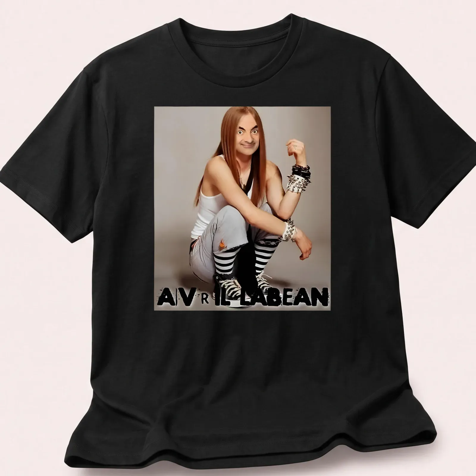 Humorous character resembling Avril Lavigne with a playful expression and bold text — printed on a unisex t-shirt