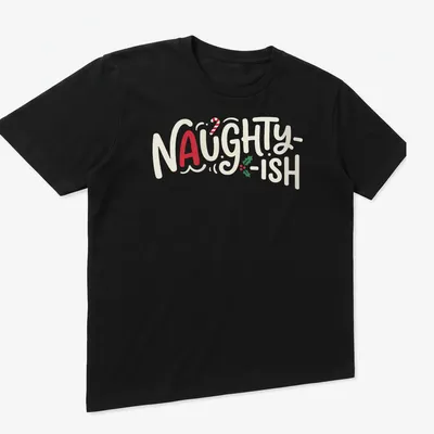 Playful lettering with the text 'Naughty-Ish' in red, green, and white on a Christmas-themed shirt. — printed on a unisex t-shirt (angled view)