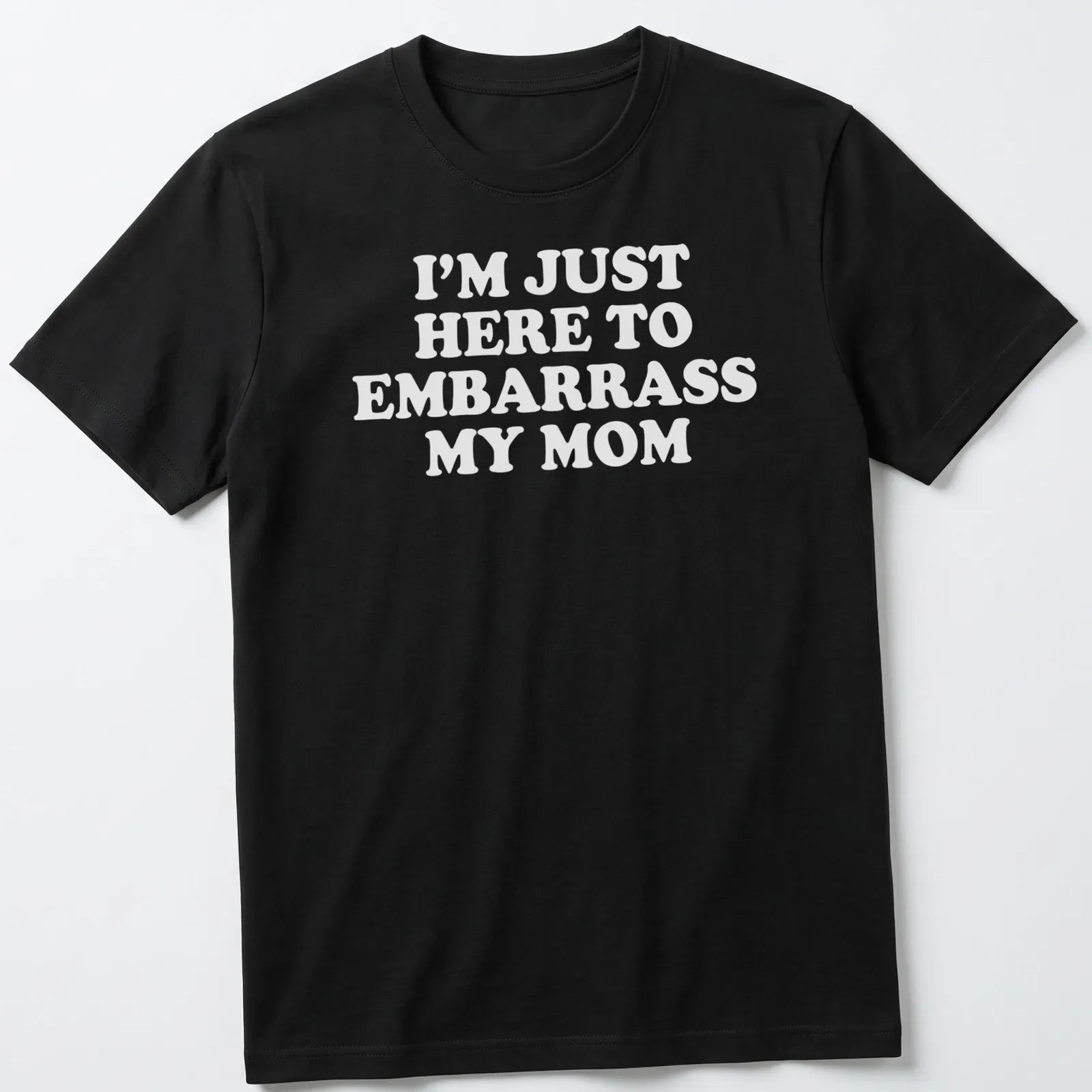 Bold white text humorously declares 'I'm Just Here To Embarrass My Mom' on a playful — printed on a unisex t-shirt