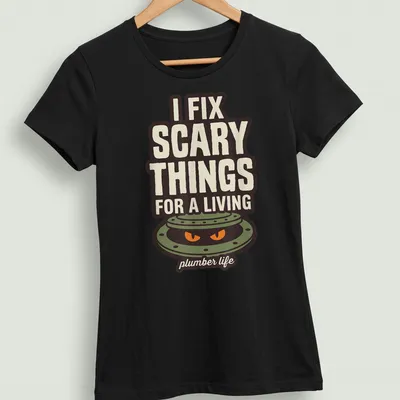 Illustration of a manhole cover with scary eyes and text I FIX SCARY THINGS FOR A LIVING. — printed on a women's shirt