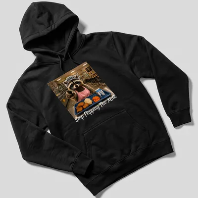 Realistic print of a raccoon lunch lady serving food with the text 'Stop Flipping The Milk' — printed on a unisex hoodie