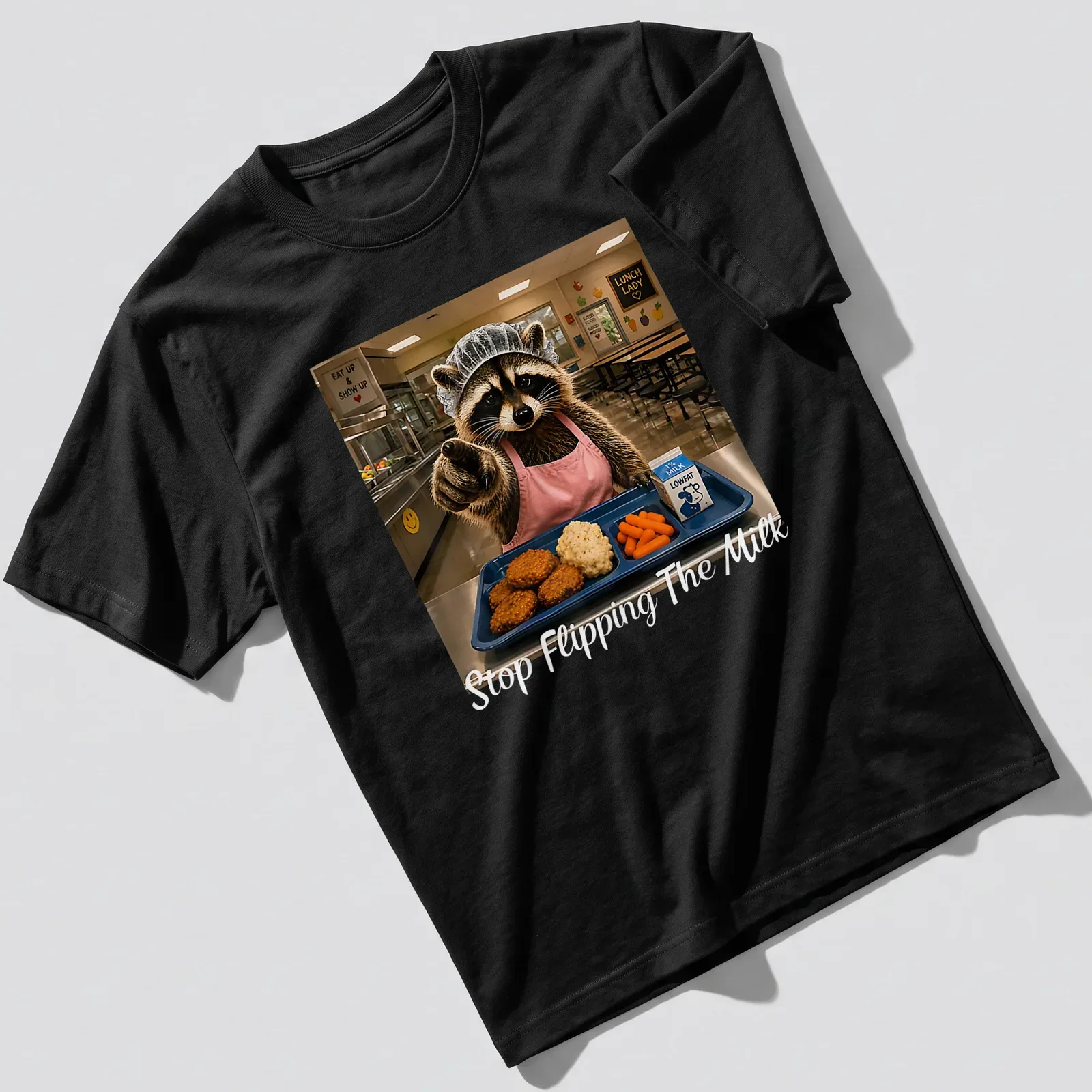 Realistic print of a raccoon lunch lady serving food with the text 'Stop Flipping The Milk' — printed on a unisex t-shirt