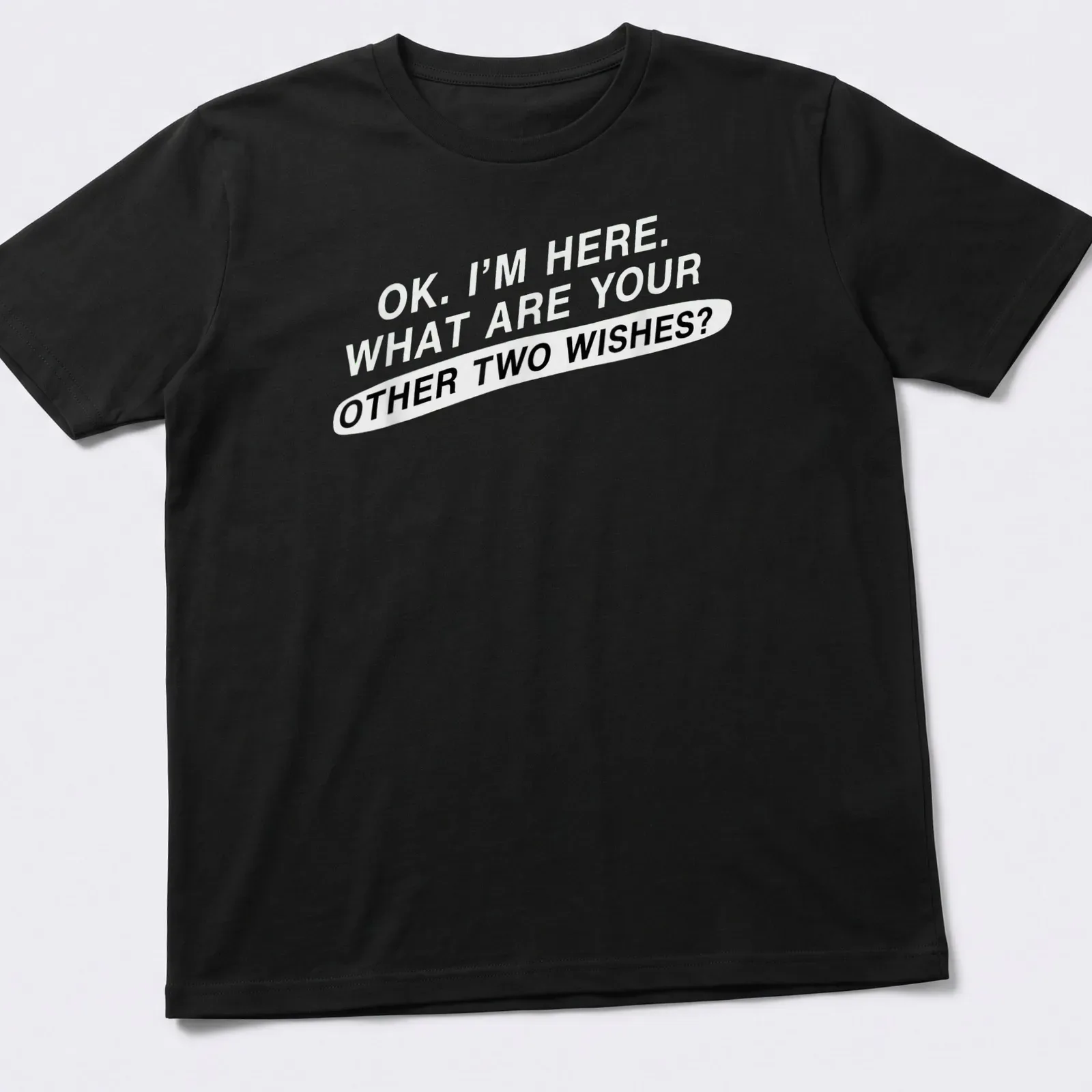 Bold typography tee featuring sarcastic text about wishes in black on white — printed on a unisex t-shirt