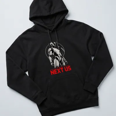 Silhouette of a futuristic android robot with text 'THE NEXT US' in black, white, and red — printed on a unisex hoodie