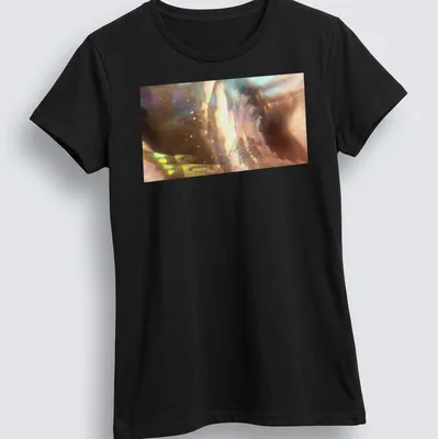 Abstract design of a galactic seashell with starlight prism in iridescent colors. — printed on a women's shirt