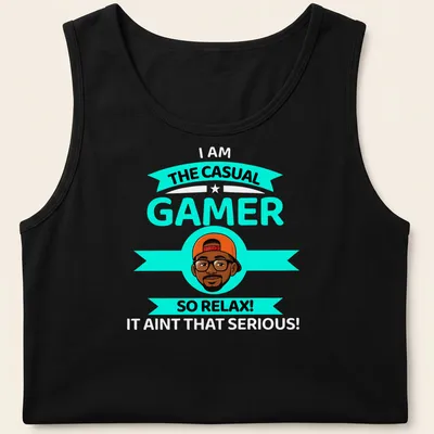 Cartoon design with text 'THE CASUAL GAMER SO RELAX!' in turquoise, black, orange, and white colors. — printed on a tank top