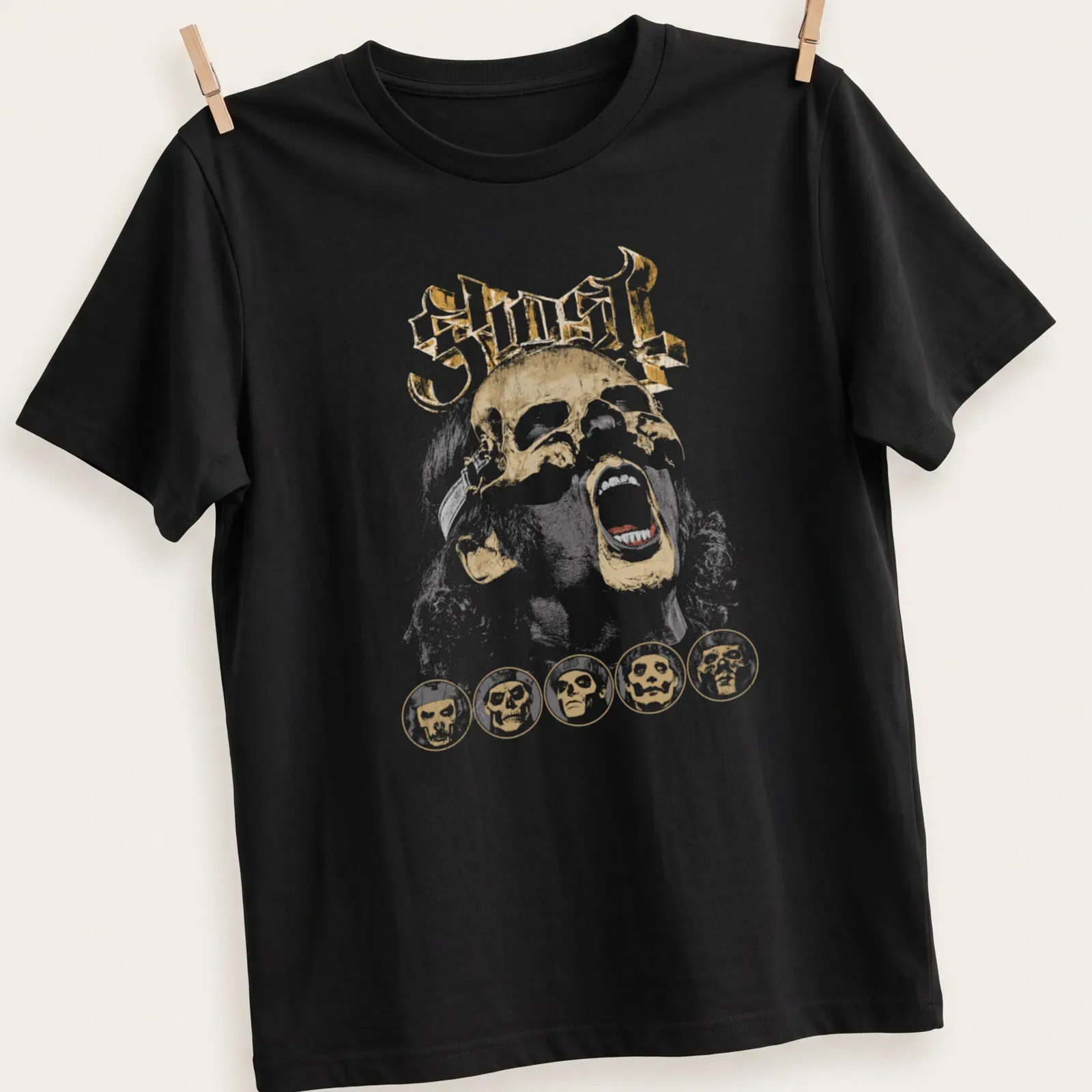 Distressed Ghost band t-shirt featuring iconic skull graphic in gold and black — printed on a unisex t-shirt