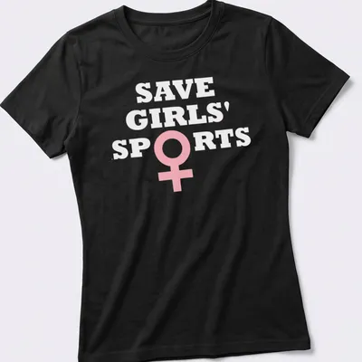 Bold typography t-shirt with the message Save Girls' Sports Biological Females in pink and white — printed on a women's shirt