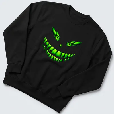 Cartoon design of a glowing green monster face with a mischievous grin — printed on a unisex sweatshirt