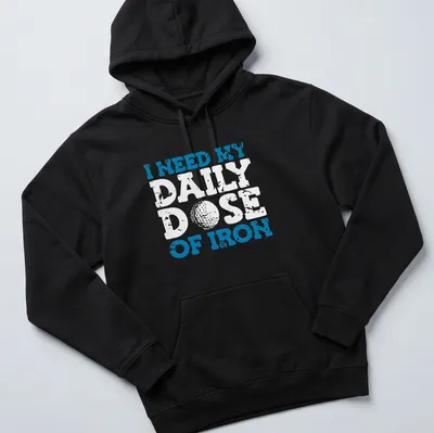 Distressed golf ball graphic with the text 'I NEED MY DAILY DOSE OF IRON' — printed on a unisex hoodie