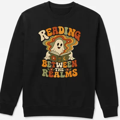 Retro style shirt with a playful ghost and the text 'Reading Between The Realms' in vibrant colors. — printed on a unisex sweatshirt