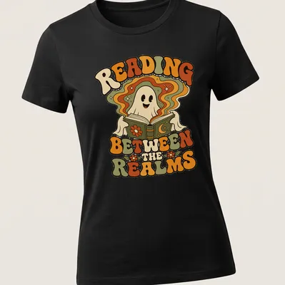 Retro style shirt with a playful ghost and the text 'Reading Between The Realms' in vibrant colors. — printed on a women's shirt