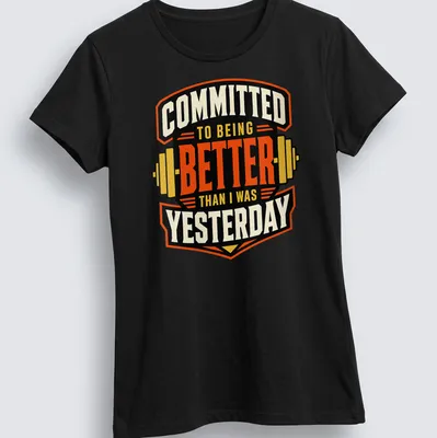 Vintage fitness t-shirt with black, orange, cream, and yellow print featuring weightlifting barbell and motivational text. — printed on a women's shirt