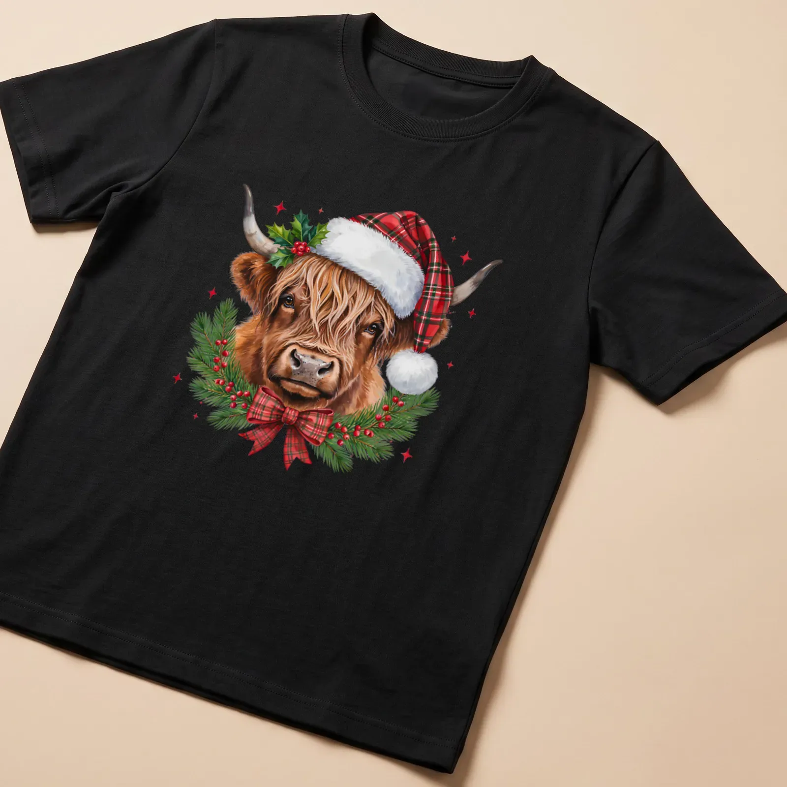Realistic illustration of a Highland cow in a Santa hat surrounded by a winter wreath — printed on a unisex t-shirt