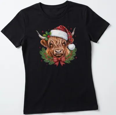 Realistic illustration of a Highland cow in a Santa hat surrounded by a winter wreath — printed on a women's shirt