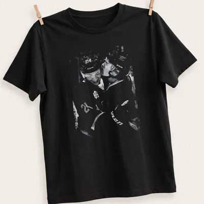 Artistic vintage print of hockey players in rivalry in black and white