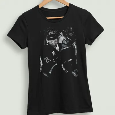 Artistic vintage print of hockey players in rivalry in black and white — printed on a women's shirt