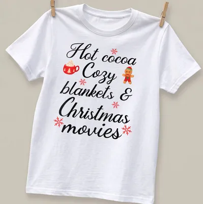 Cute typography shirt with hot cocoa, cozy blankets, and Christmas movies design