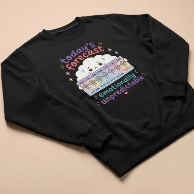 Kawaii cloud design with playful text about unpredictable emotions in pastel colors — printed on a unisex sweatshirt