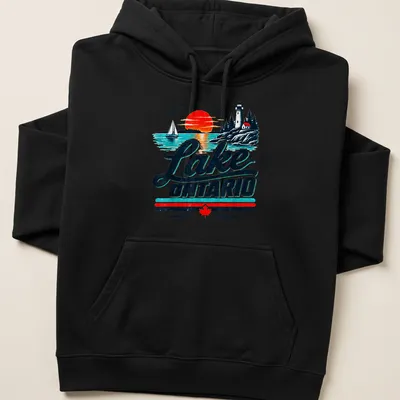 Vintage retro Lake Ontario T-shirt featuring a scenic lighthouse and sailboat — printed on a unisex hoodie