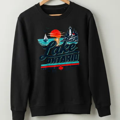 Vintage retro Lake Ontario T-shirt featuring a scenic lighthouse and sailboat — printed on a unisex sweatshirt