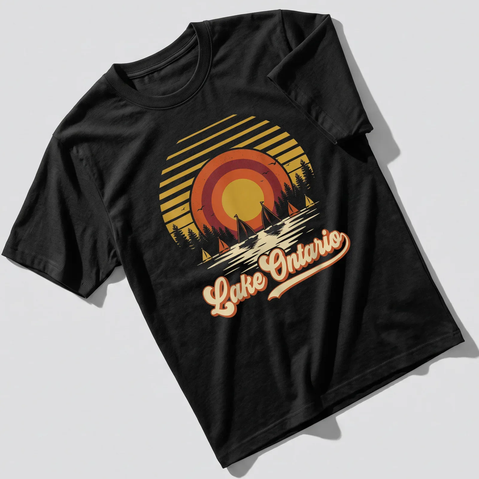 Retro vintage t-shirt with Lake Ontario text and sailboats against a sunset — printed on a unisex t-shirt