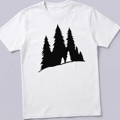 Black silhouette of a forest on a T-shirt, evoking nature's beauty