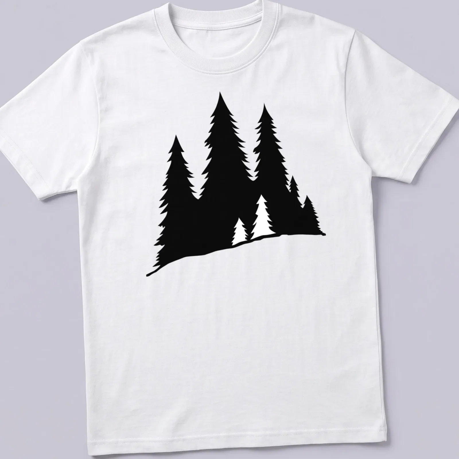 Black silhouette of a forest on a T-shirt, evoking nature's beauty — printed on a unisex t-shirt