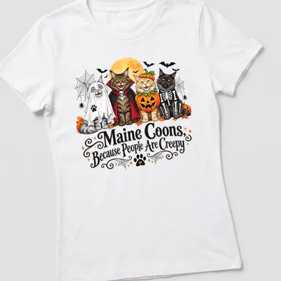 Colorful cartoon Maine Coons in Halloween costumes with humorous text — printed on a women's shirt