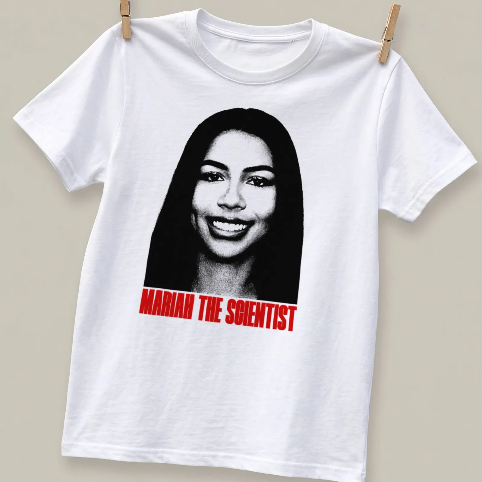 Bold typography t-shirt featuring Mariah The Scientist in black, white, and red — printed on a unisex t-shirt