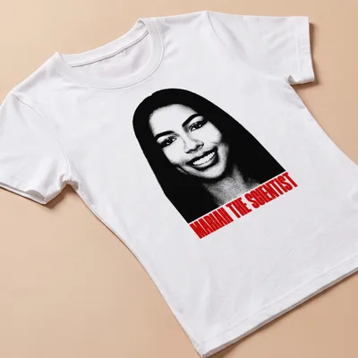 Bold typography t-shirt featuring Mariah The Scientist in black, white, and red — printed on a women's shirt