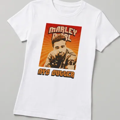 Retro distressed Marley Marl NYC Cutter T-shirt in orange, brown, cream, and black — printed on a women's shirt