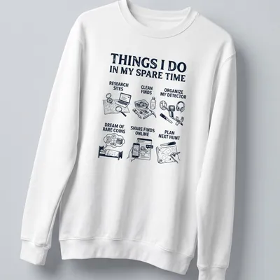 Illustrative t-shirt featuring activities related to metal detecting in navy blue and white. — printed on a unisex sweatshirt