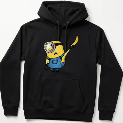 Cartoon Minion Stuart holding a banana in bright yellow and blue — printed on a unisex hoodie