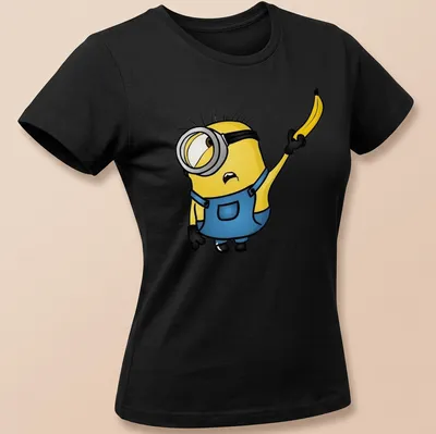 Cartoon Minion Stuart holding a banana in bright yellow and blue — printed on a women's shirt