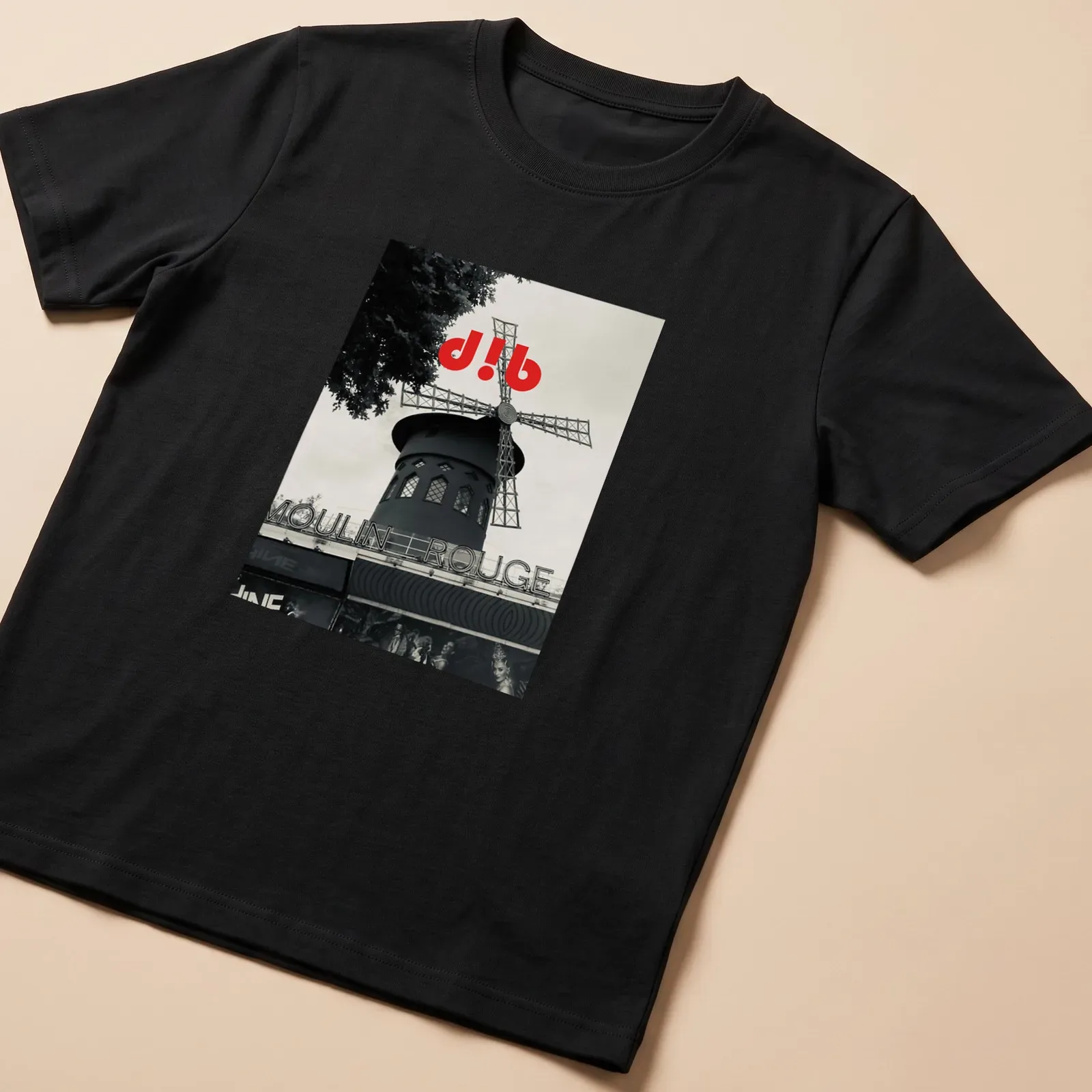 Black and white illustration of the Moulin Rouge windmill with red accents — printed on a unisex t-shirt