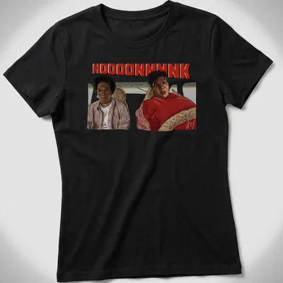 Illustrative Norbit movie characters with humorous text in vibrant colors — printed on a women's shirt