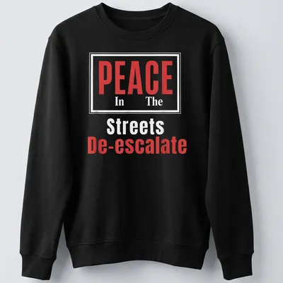 Bold typography t-shirt with the message PEACE In The Streets De-escalate in red and white. — printed on a unisex sweatshirt