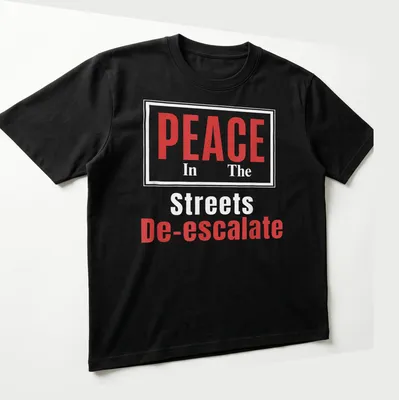 Bold typography t-shirt with the message PEACE In The Streets De-escalate in red and white. — printed on a unisex t-shirt (angled view)