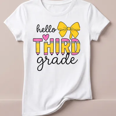 Colorful illustration of pencils and a bow with the text 'hello ❤️ THIRD grade' — printed on a women's shirt