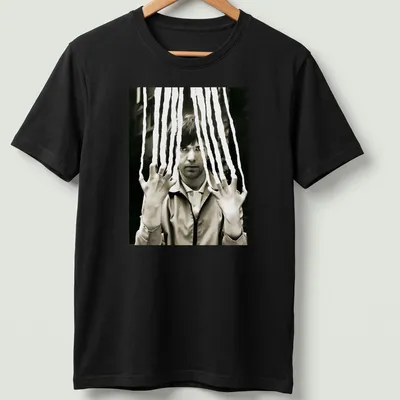 Black and white portrait of Peter Gabriel with a scratched effect