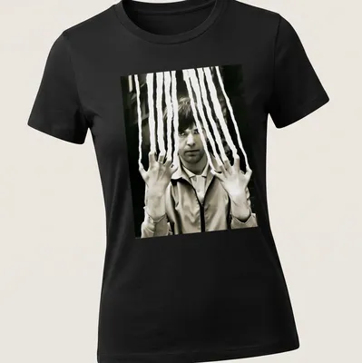 Black and white portrait of Peter Gabriel with a scratched effect — printed on a women's shirt