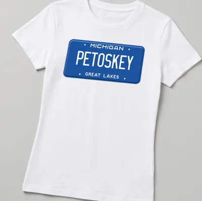 Vintage license plate design featuring Michigan Petoskey Great Lakes text — printed on a women's shirt