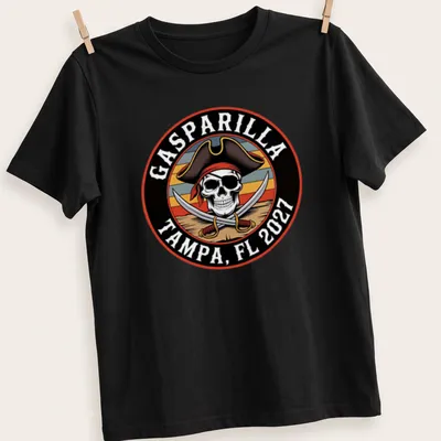 Vintage Gasparilla shirt featuring a pirate skull and festival text in multiple colors