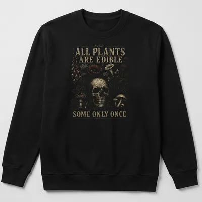 Vintage-style tee with a skull and plants along with a humorous slogan — printed on a unisex sweatshirt